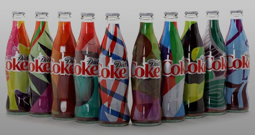 A picture of bottles of diet coke arranged in a 'v' formation.