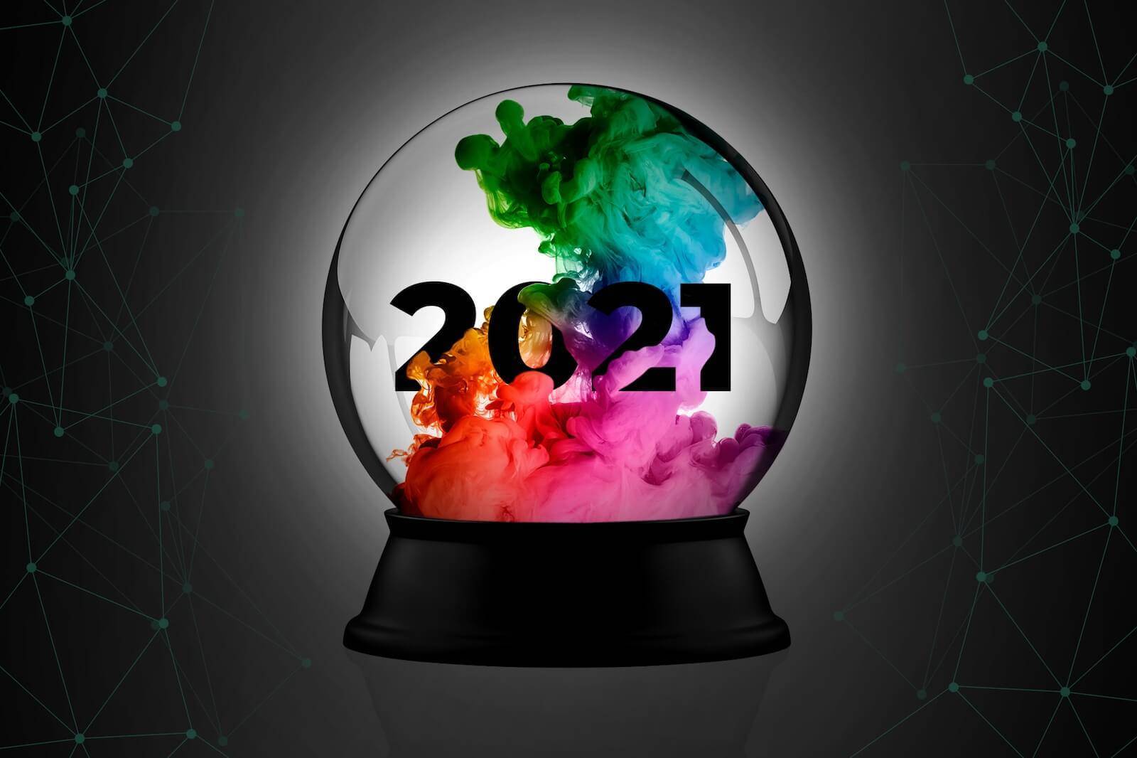 2021 inside of a crystal ball with ink swirling around it.