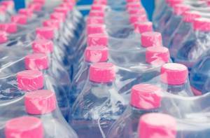case of water bottles in shrink sleeve packaging