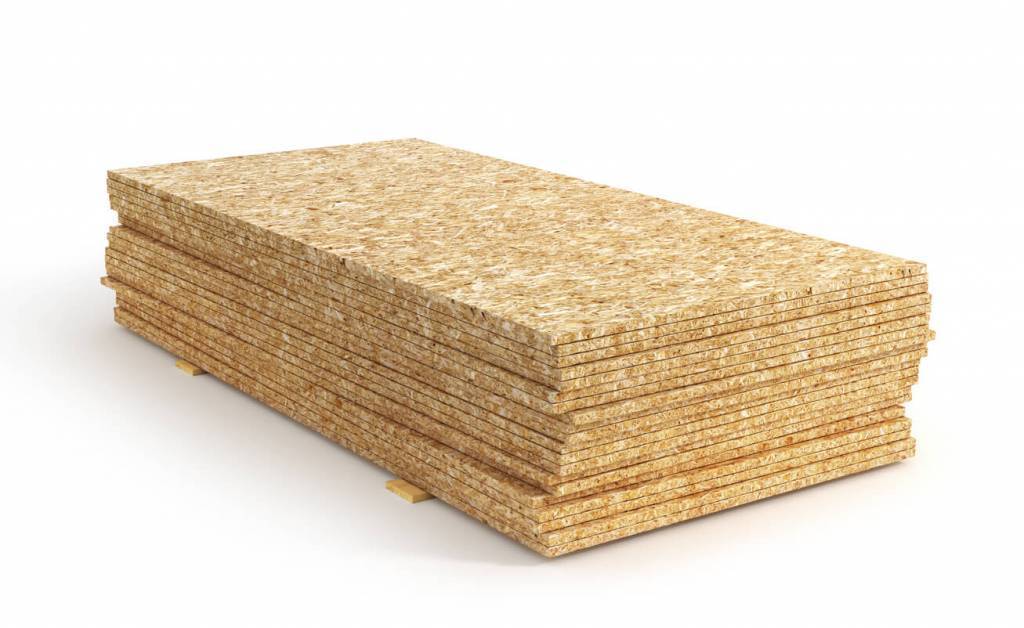 Stack of oriented strand board isolated on a white background