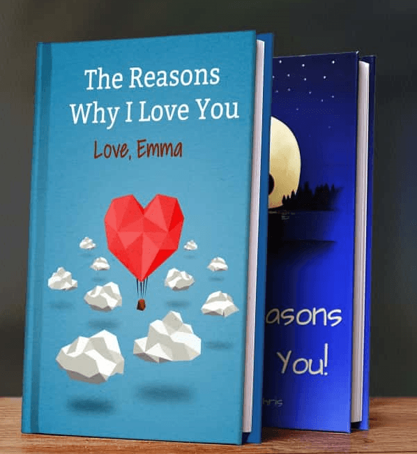 two books stacked atop one another, the top books reads "the reasons why I love you. - Love, Emma"