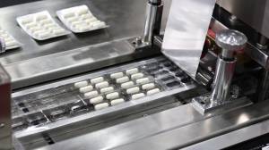 photo of machine blister packaging pharmaceuticals