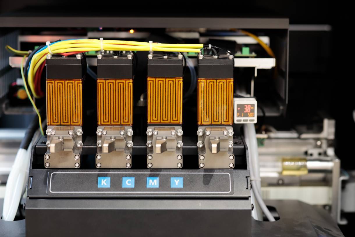 Showing the print heads of a piezo industrial inkjet printer