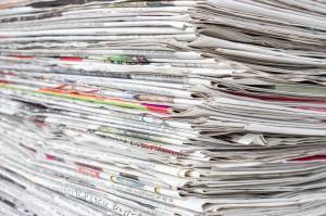 stack of newspapers which began using soy inks in the 1980s