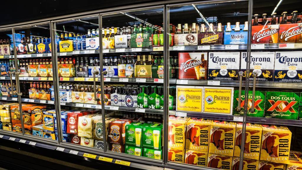 variety of beer brands in store coolers