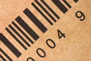 barcode printed in black on brown corrugated cardboard